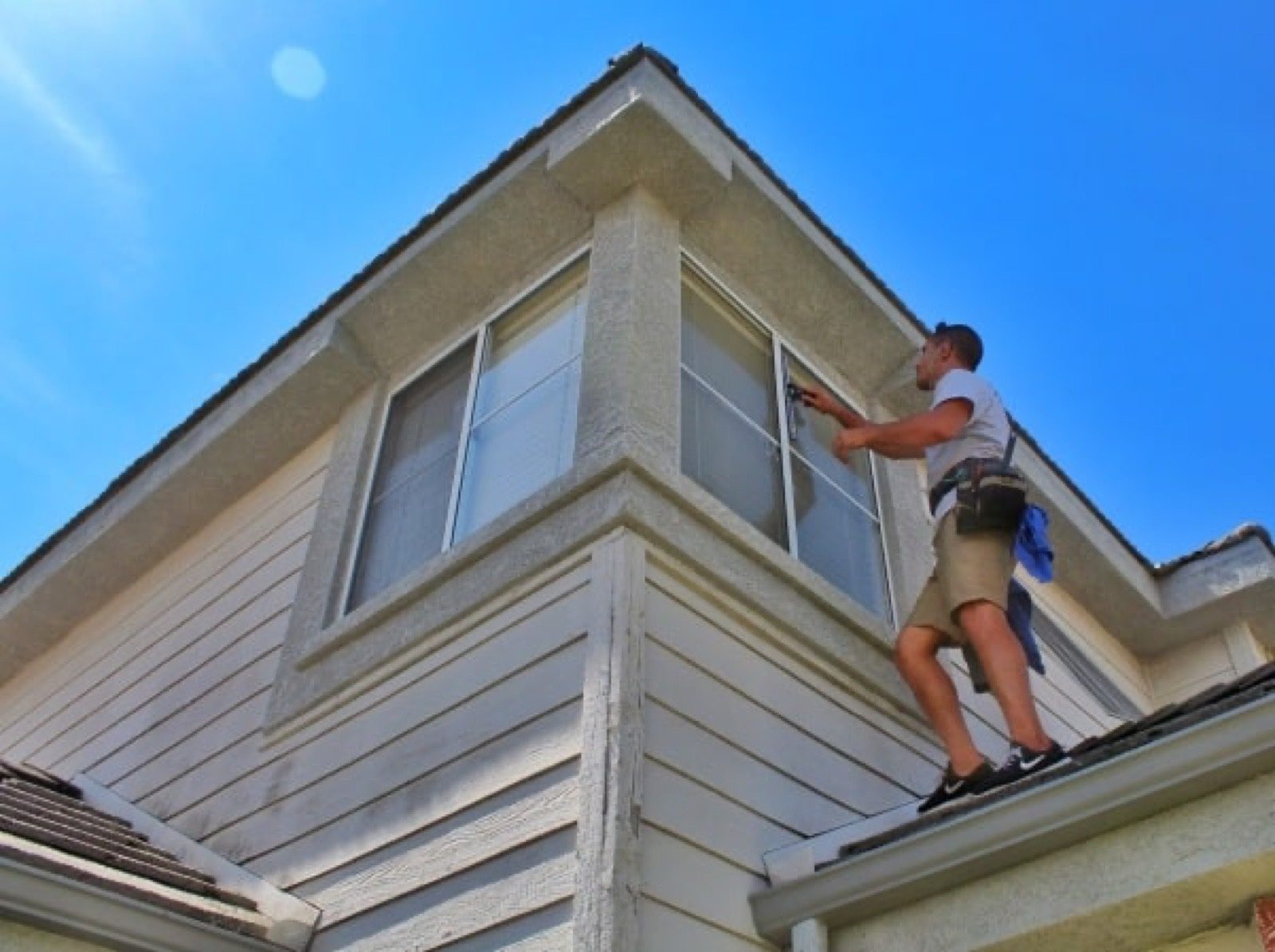 Restore technician working from a roof