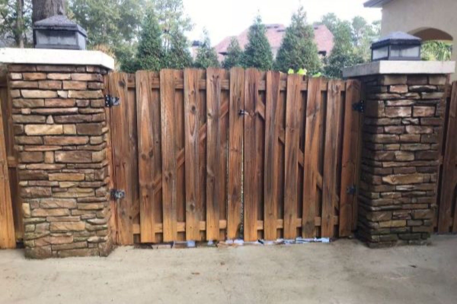 Wood fence restored after cleaning